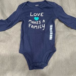 “Love makes a family” Carters long sleeve onesie. Size 18 months